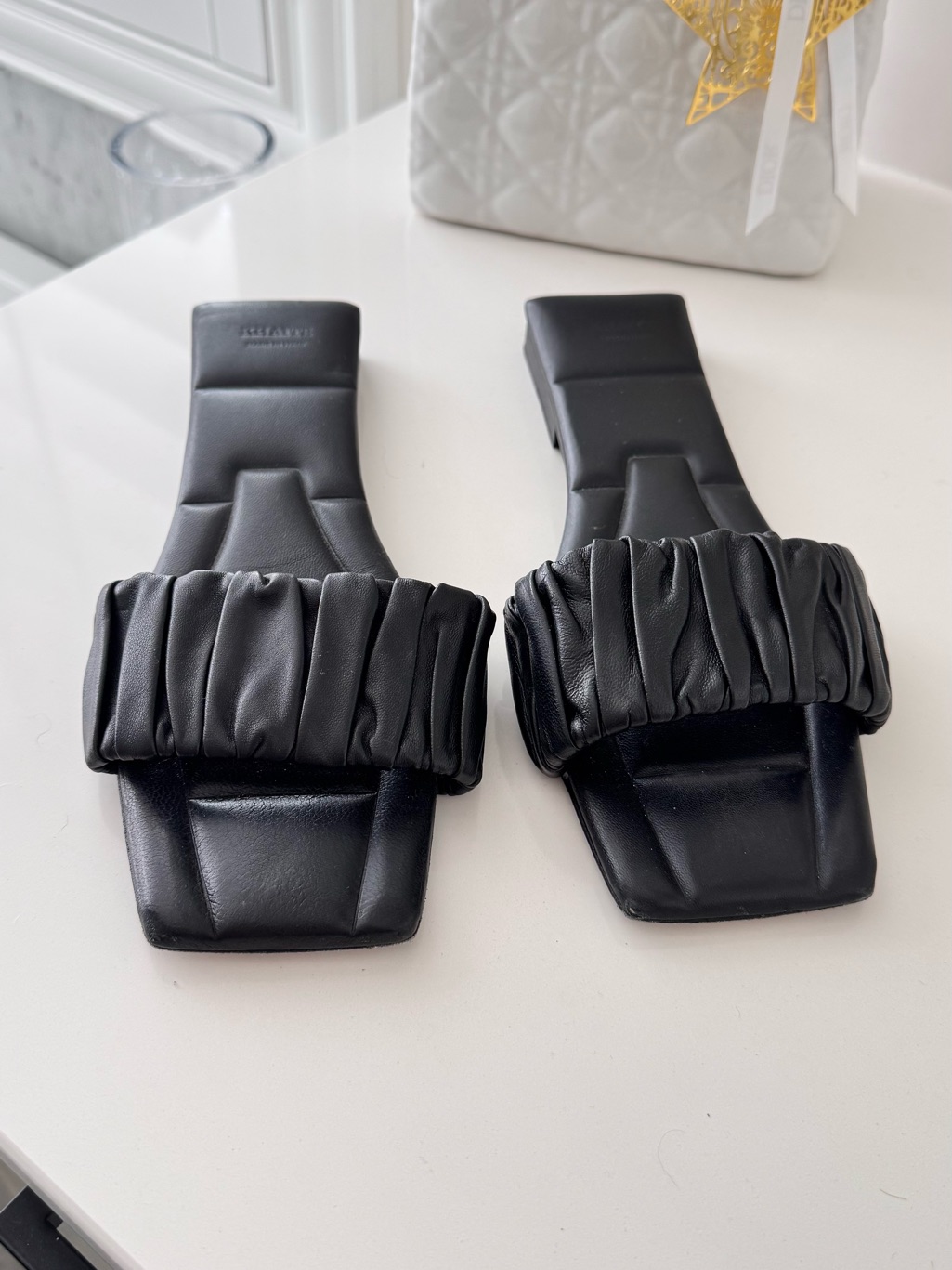 Khaite Crete Ruched Leather Slide